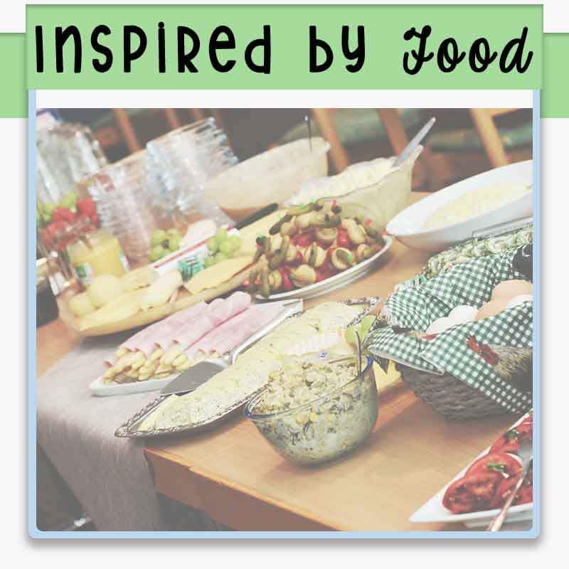 party table setup with variety of finger foods with text overlay inspired by food
