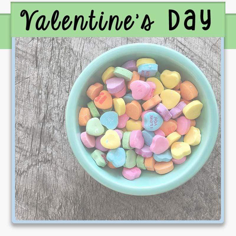 Valentine’s Day bowl of hearts with text overlay valentine's day